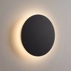 Aplique de pared LED inalámbrico en color negro o blanco, con control táctil y diseño minimalista, ideal para iluminar espacios modernos. 1