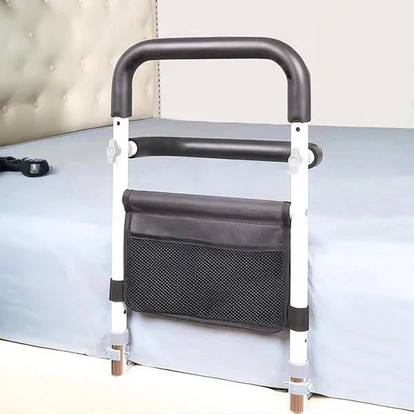 Barandilla de cama ajustable con agarre antideslizante y bolsa de almacenamiento, diseñada para ofrecer soporte seguro a adultos mayores. 1