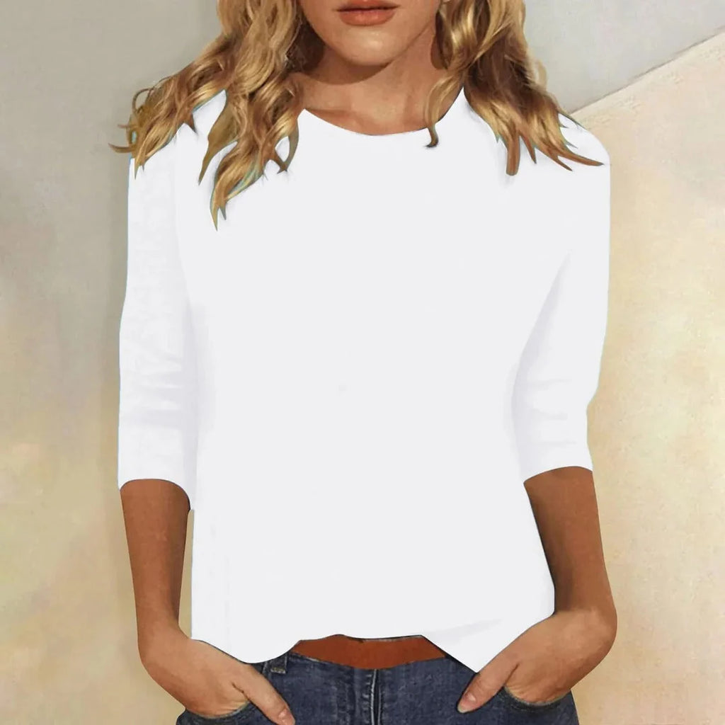 Blusa casual de manga 3/4 con cuello redondo, diseñada con una mezcla de telas para un estilo diario cómodo y moderno. 2