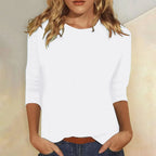 Blusa casual de manga 3/4 con cuello redondo, diseñada con una mezcla de telas para un estilo diario cómodo y moderno. 2