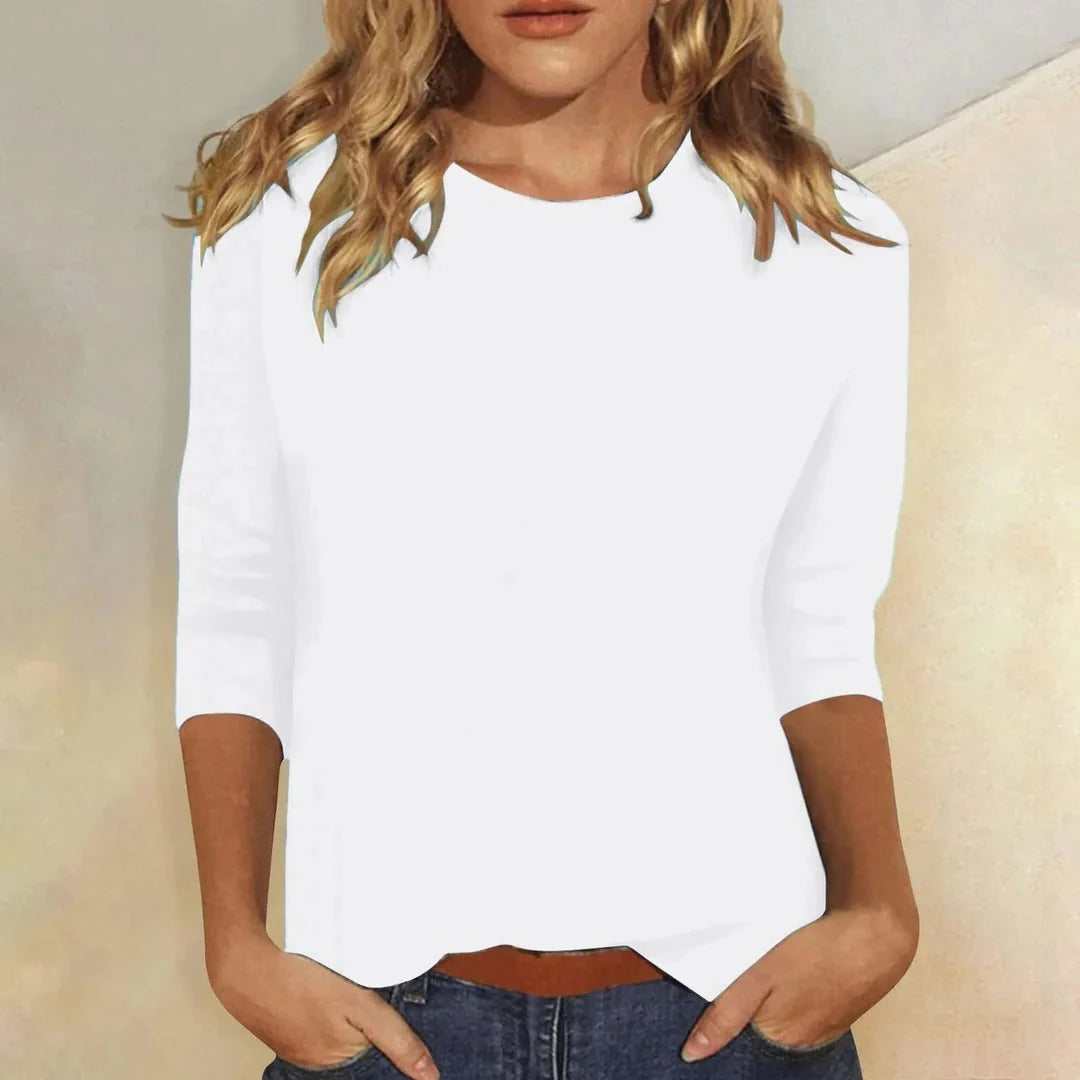 Blusa casual de manga 3/4 con cuello redondo, diseñada con una mezcla de telas para un estilo diario cómodo y moderno. 2