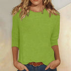 Blusa casual de manga 3/4 con cuello redondo, diseñada con una mezcla de telas para un estilo diario cómodo y moderno. 5