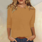 Blusa casual de manga 3/4 con cuello redondo, diseñada con una mezcla de telas para un estilo diario cómodo y moderno. 8