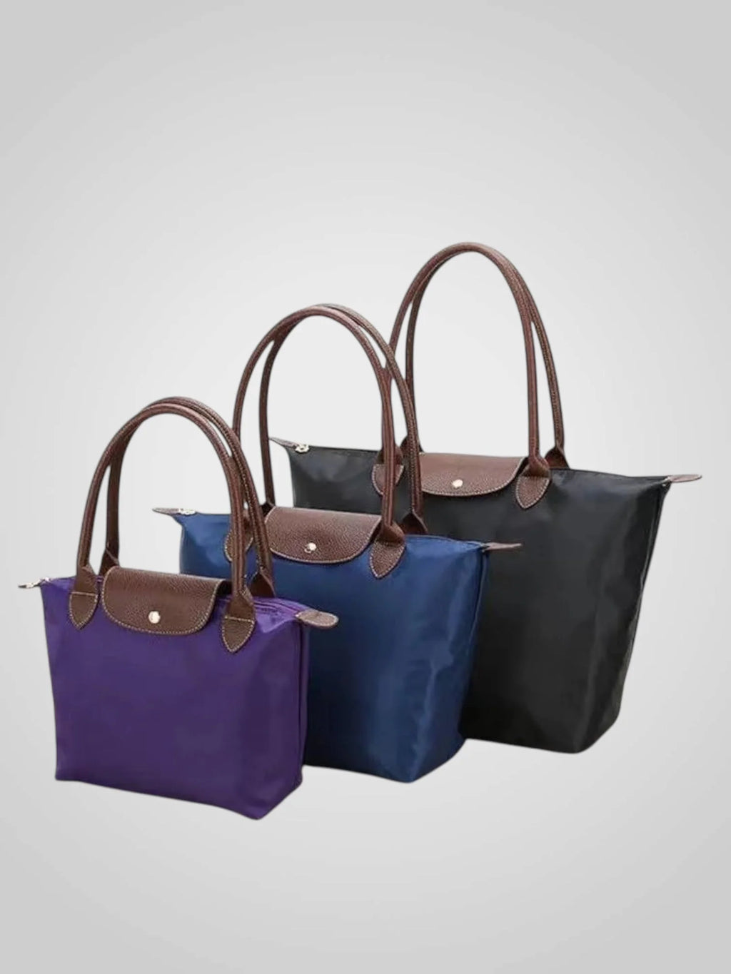 Bolso de hombro para mujer en cuero sintético negro, con correa ajustable, diseño amplio y elegante, ideal para el uso diario. 1