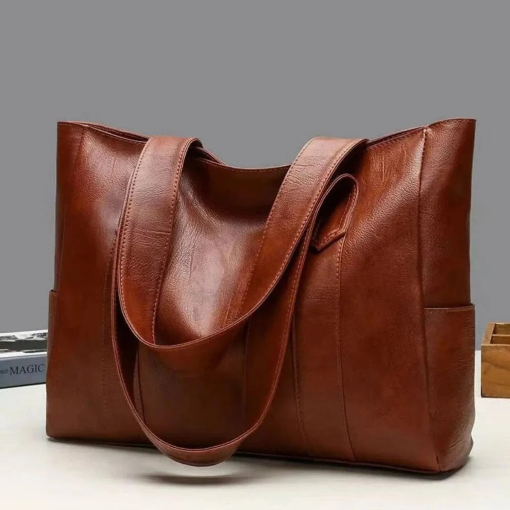 Bolso de hombro de mujer en cuero PU negro, elegante y versátil, con múltiples bolsillos, ideal para uso diario. 0