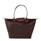 Bolso de mano para hombre resistente al agua, elegante diseño en nylon y cuero, amplio espacio de almacenamiento ideal para uso diario y actividades al aire libre 3