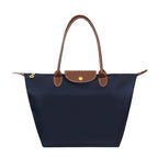 Bolso de mano para hombre resistente al agua, elegante diseño en nylon y cuero, amplio espacio de almacenamiento ideal para uso diario y actividades al aire libre 6