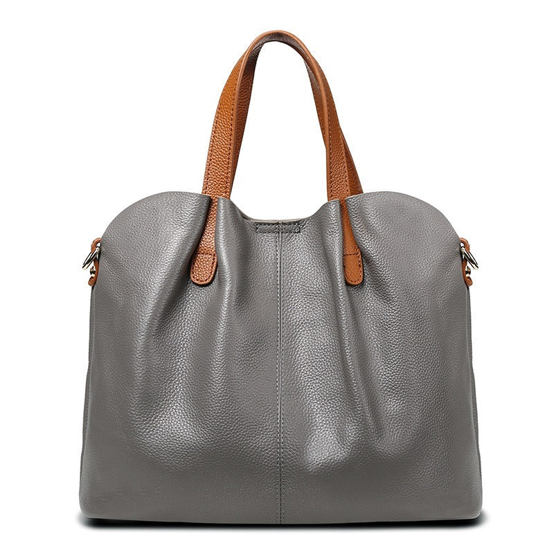 Bolso de mano para mujer de piel de vacuno con textura lichi, espacioso y elegante, con correa ajustable ideal para cualquier ocasión 0