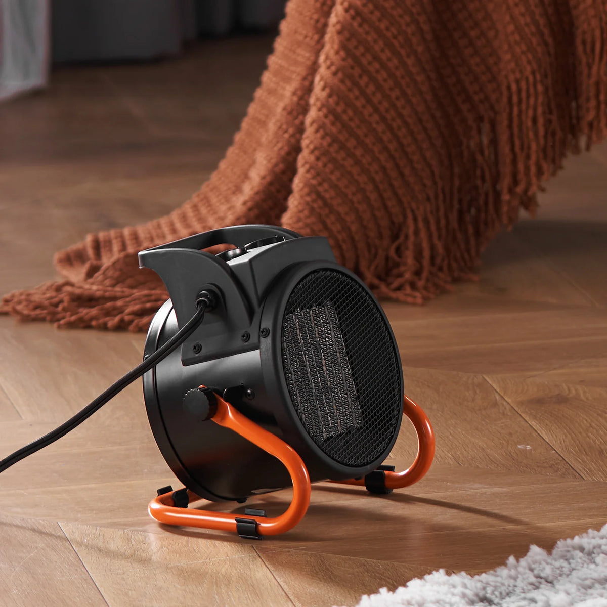 Calefactor portátil cerámico de 1500 W en color negro y naranja, con ángulo ajustable, ideal para invernaderos y 1