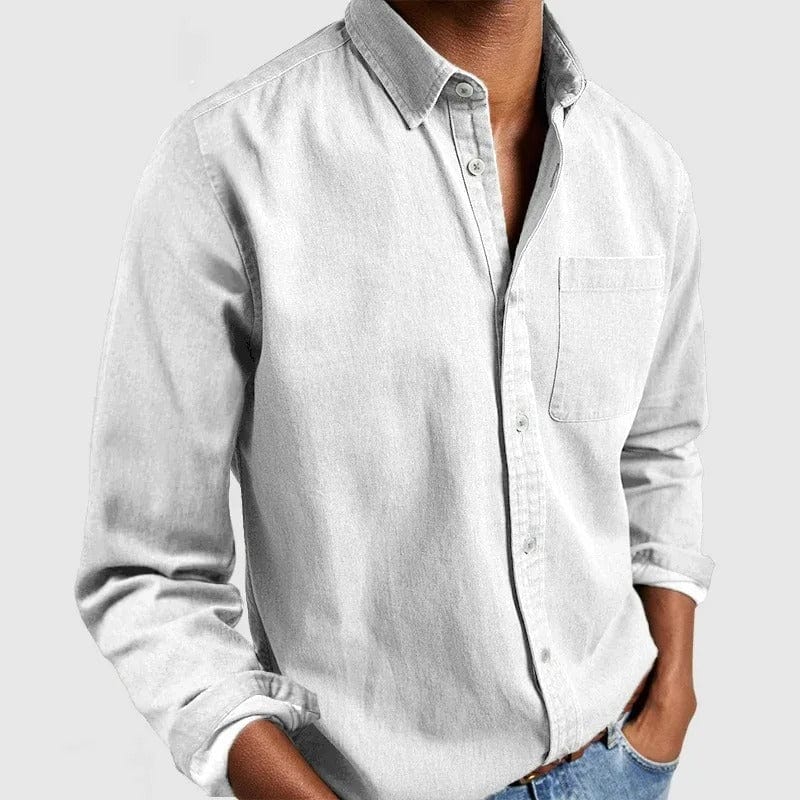 Camisa de hombre clásica de mangas largas con bolsillo, confeccionada en tejido suave y transpirable, perfecta para oficina y ocasiones casuales. 1