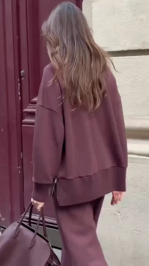 Conjunto de dos piezas para mujer con pantalón de pierna ancha y top holgado en estilo casual minimalista, ideal para looks relajados 2