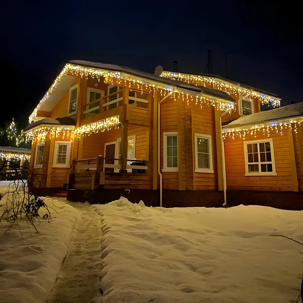 Cortina de luces navideñas LED exterior resistente al agua con luz blanca cálida, dimensiones de 4 x 0,6 m y 2