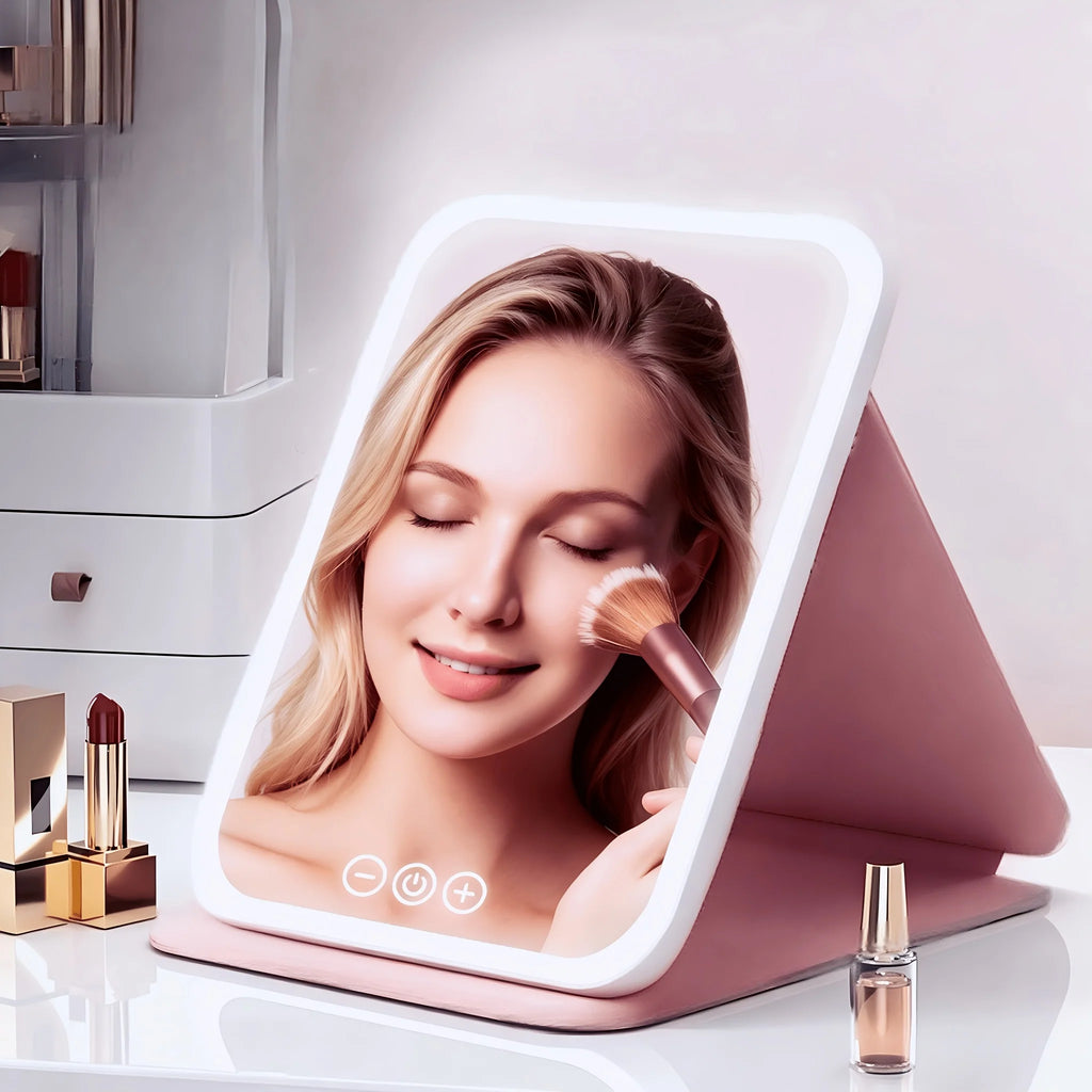 Espejo tocador con luz táctil, plegable y portátil, de diseño moderno en plástico rosa, ideal para maquillaje y cuidado personal. 4