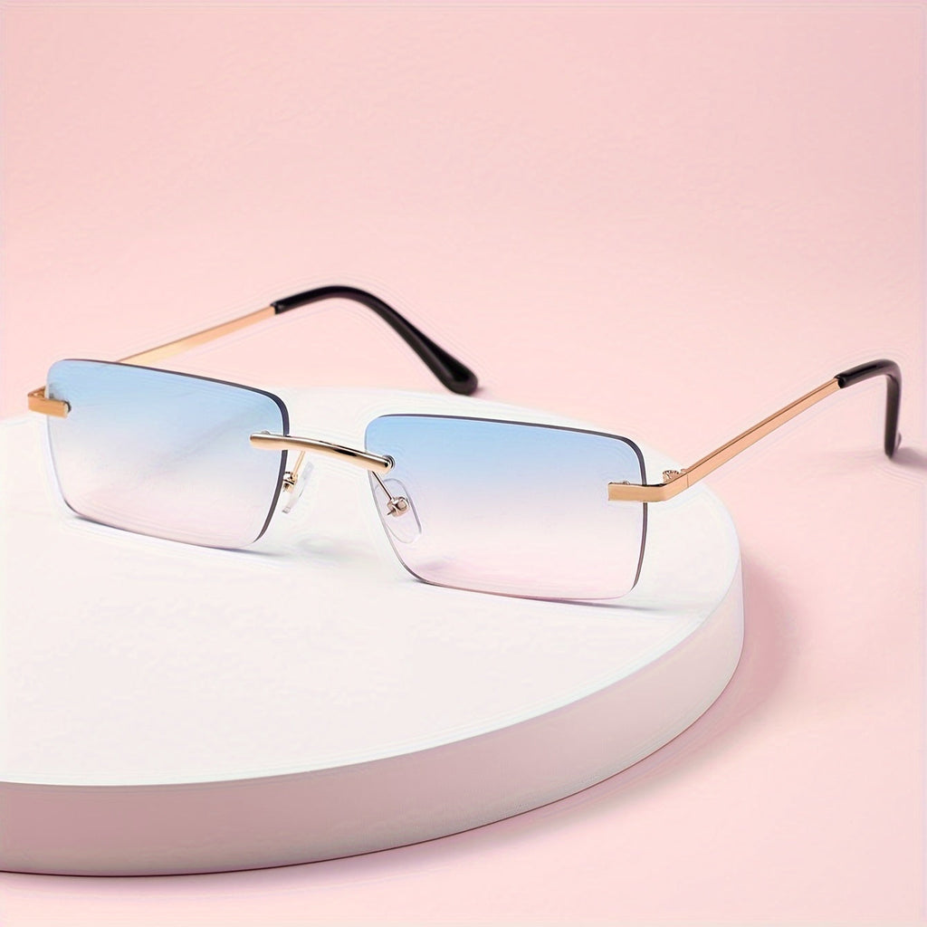 Gafas de sol sin montura con protección UV, marco metálico ligero y diseño moderno unisex, ideales para cualquier ocasión. 0