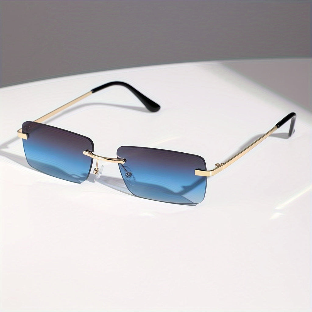 Gafas de sol sin montura con protección UV, marco metálico ligero y diseño moderno unisex, ideales para cualquier ocasión. 1