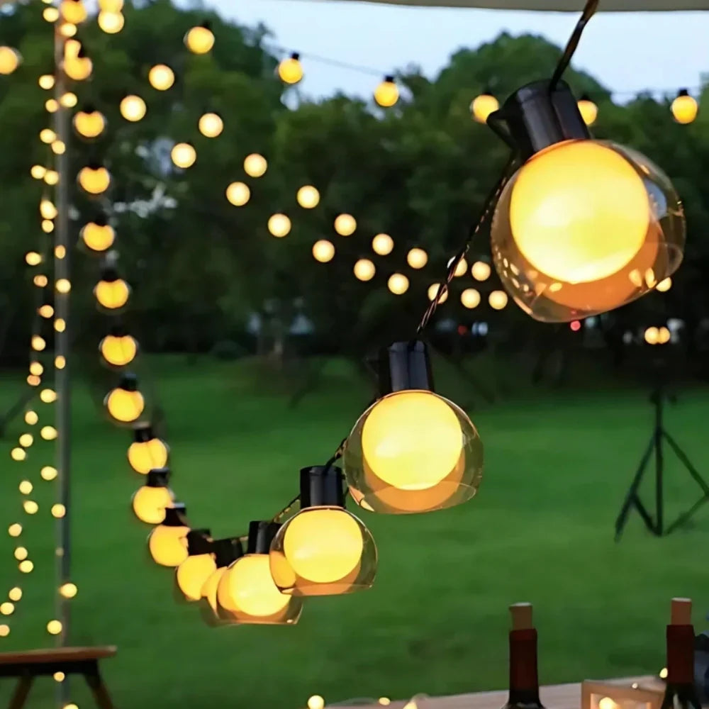 Guirnalda de luces solares exteriores de 5m y 10m con luz cálida, perfecta para iluminar jardines y terrazas. 0