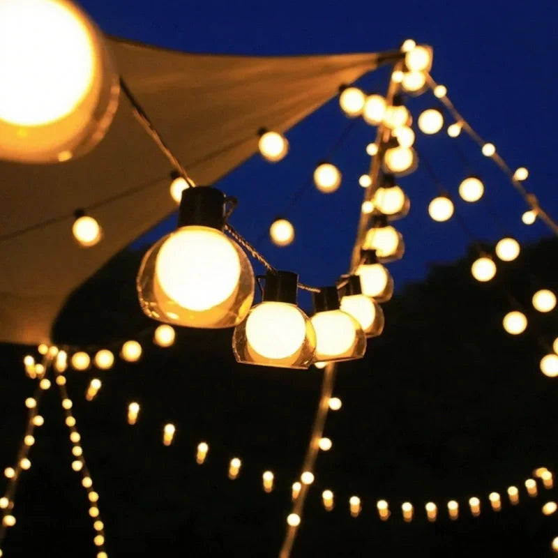 Guirnalda de luces solares exteriores de 5m y 10m con luz cálida, perfecta para iluminar jardines y terrazas. 1