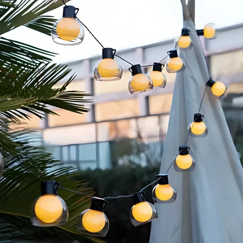 Guirnalda de luces solares exteriores de 5m y 10m con luz cálida, perfecta para iluminar jardines y terrazas. 7