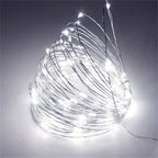Guirnalda de luces exterior LED a pilas con diseño discreto de cobre, disponible en varias longitudes y colores, ideal para decorar espacios 3