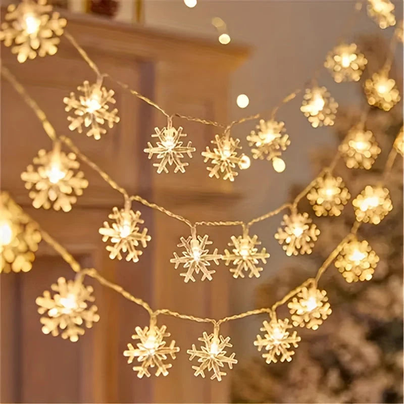 Guirnalda de luces LED con diseño de copo de nieve en múltiples longitudes y colores, ideal para decoración interior y exterior en festividades 2