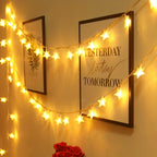 Guirnalda de luces LED con forma de estrella a pilas, ideal para decoración, disponible en varias longitudes y emitiendo luz blanca 1