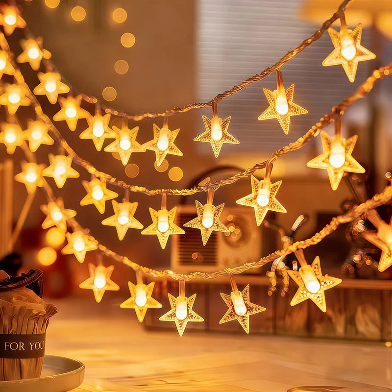 Guirnalda de luces LED en forma de estrella con colores múltiples y alimentación a pilas, ideal para decoración navideña y festiva. 0