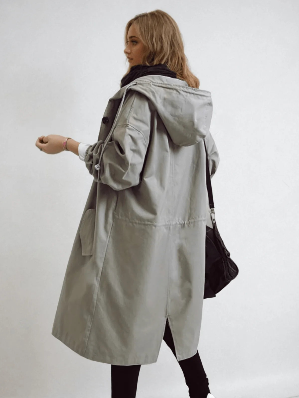 Impermeable mujer repelente al agua con diseño clásico de gabardina, fabricado en tela ligera y duradera, ideal para protección contra la 7