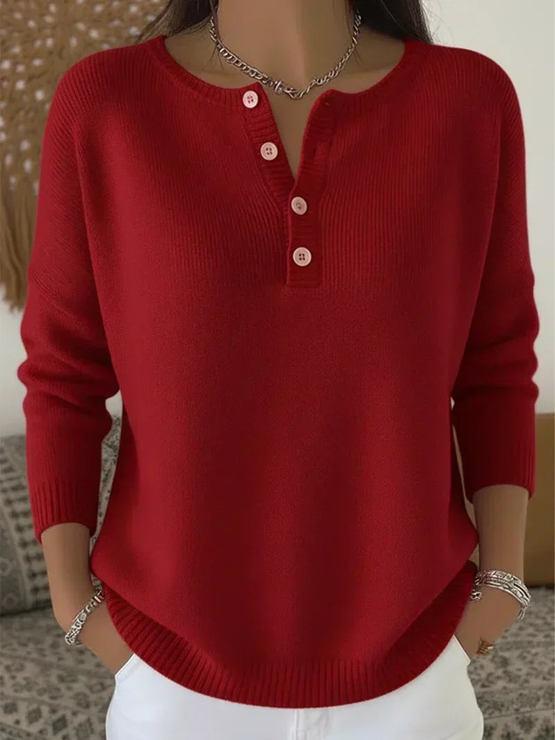 Jersey de mujer acanalado en color neutro, con escote Henley y hombros caídos, ideal para mantener la comodidad en otoño 2