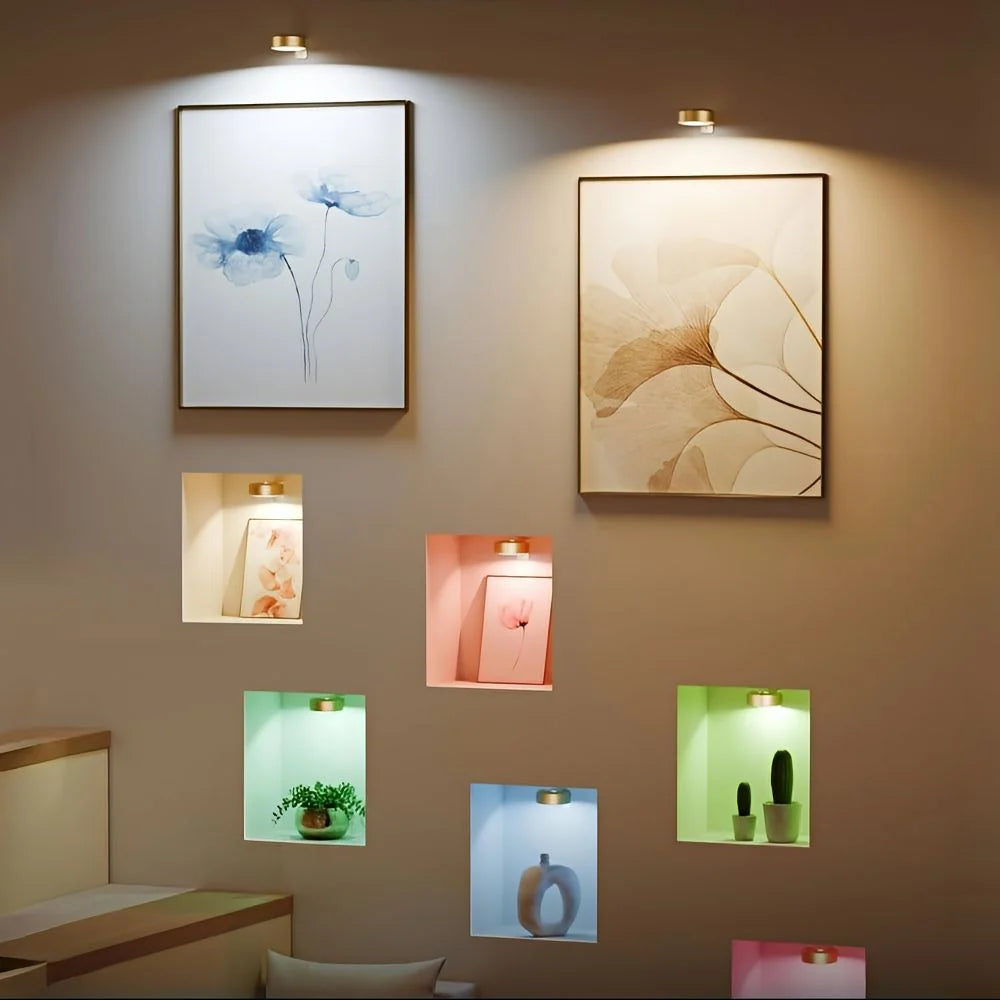 Juego de focos LED recargables con control remoto, ideal para iluminación inalámbrica ajustable de obras de arte, mostrando su versatilidad y 2