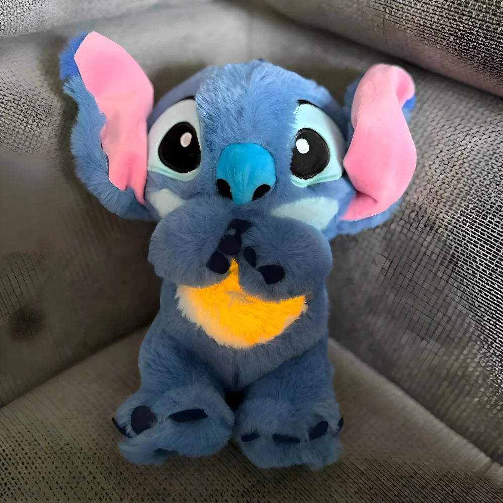 Juguete de peluche suave con luz respiratoria y sonidos calmantes para niños, ideal para abrazar y ayudar a relajar. 0