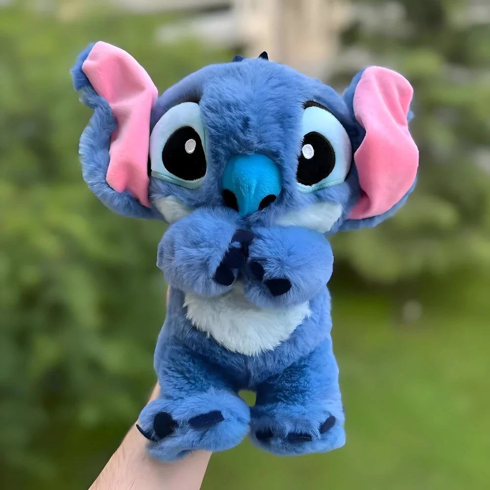 Juguete de peluche suave con luz respiratoria y sonidos calmantes para niños, ideal para abrazar y ayudar a relajar. 1
