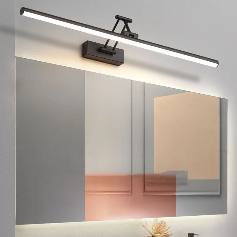 Lámpara de pared LED ajustable de diseño lineal en acabado metálico, disponible en negro o blanco, ideal para interiores y con clasificación IP 0