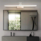 Lámpara de pared LED ajustable de diseño lineal en acabado metálico, disponible en negro o blanco, ideal para interiores y con clasificación IP 2