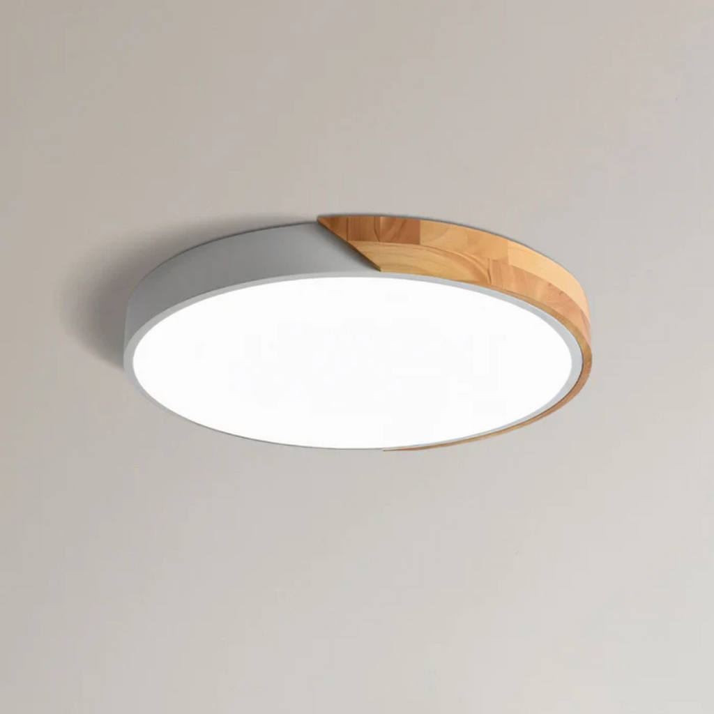 Lámpara de techo LED de diseño escandinavo en madera y acrílico, ideal para una iluminación suave y eficiente en interiores modernos. 9