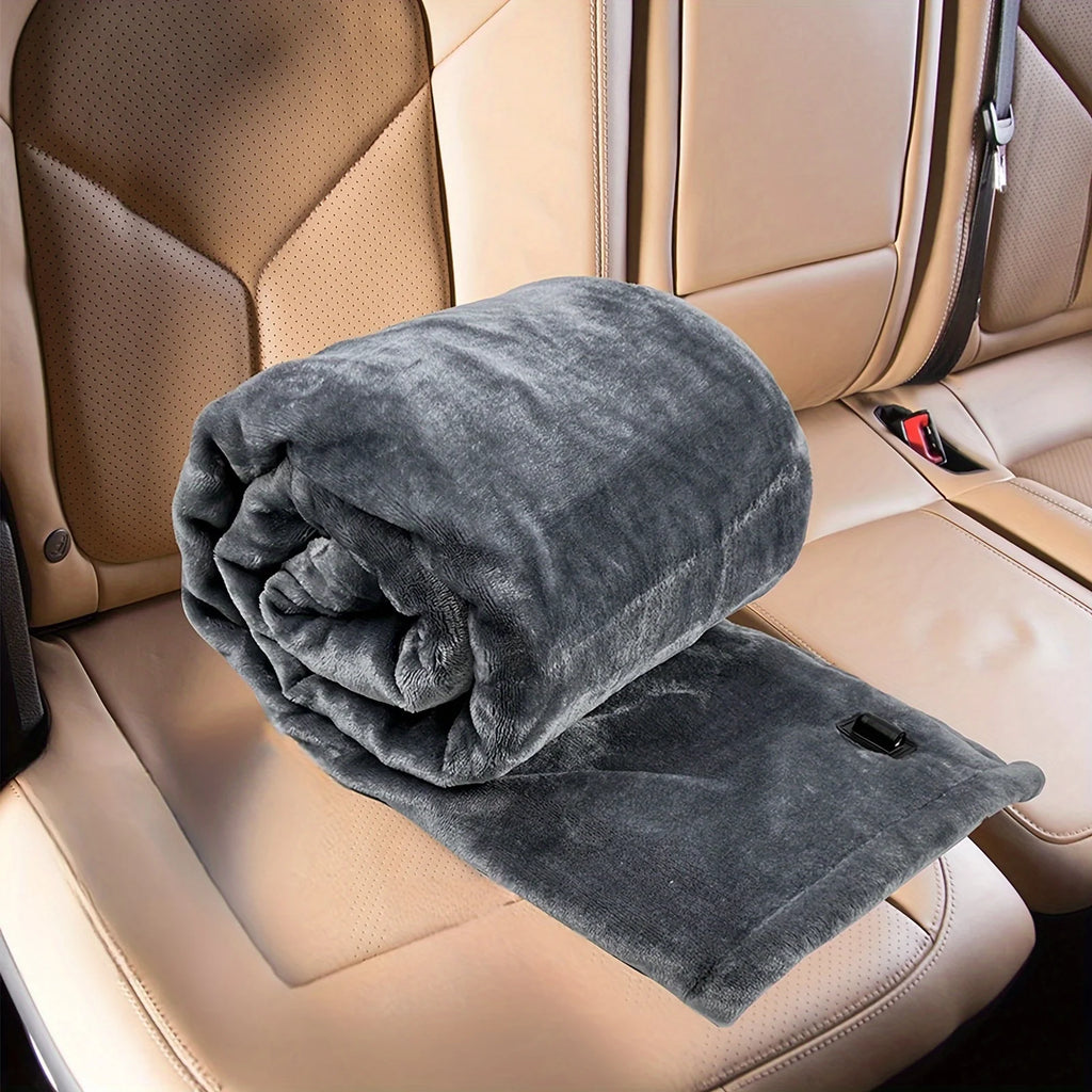 Manta térmica para coche 12V con 9 niveles de calor y temporizador, ideal para mantener la comodidad en viajes en vehículo. 1