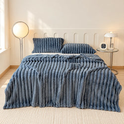 Manta de felpa acanalada de poliéster con textura en relieve, disponible en varios colores y tamaños, ideal para abrigo y decoración 0