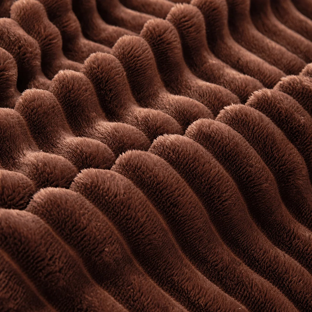 Manta de felpa acanalada de poliéster con textura en relieve, disponible en varios colores y tamaños, ideal para abrigo y decoración 8