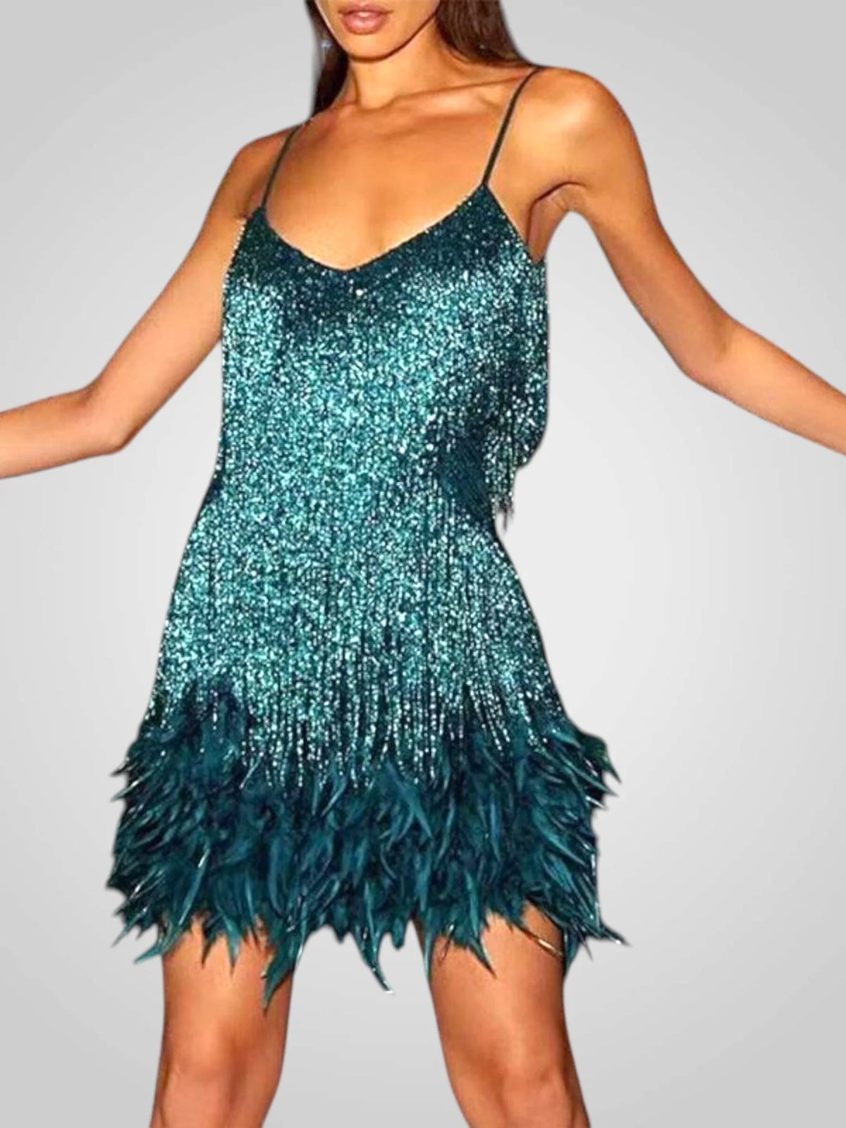 Minivestido elegante con detalles de plumas, silueta chic y ajuste cómodo, ideal para fiestas y ocasiones especiales. 5