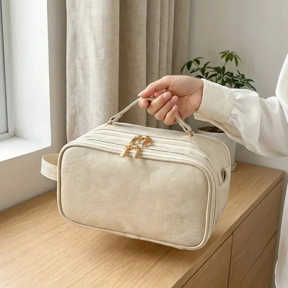 Neceser de maquillaje de cuero PU impermeable para mujer, con doble cremallera y apertura plana, ideal para organizar cosméticos y accesorios. 1