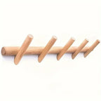Perchero de pared de roble macizo con diseño escandinavo minimalista, ideal como organizador funcional para un hogar moderno. 3