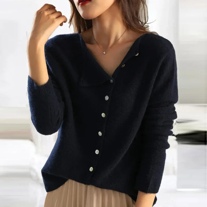 Jersey de punto con botones y cuello en pico en color negro