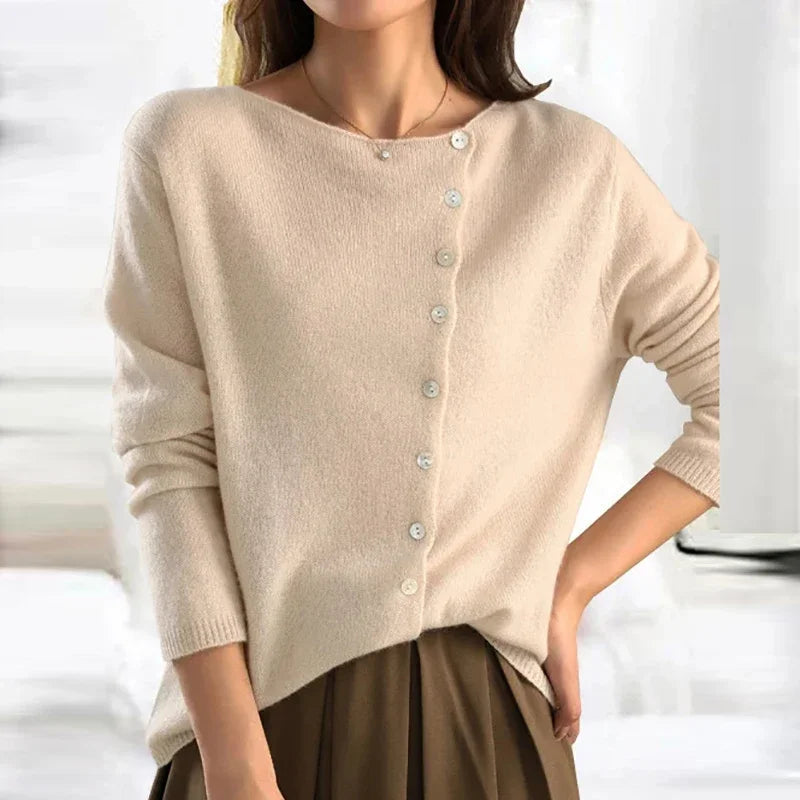 Jersey de punto con botones y cuello en pico en color crema