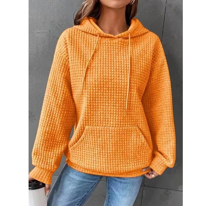 Sudadera mujer negra con capucha ajustable y bolsillo canguro, corte relajado en punto gofrado texturizado. 9