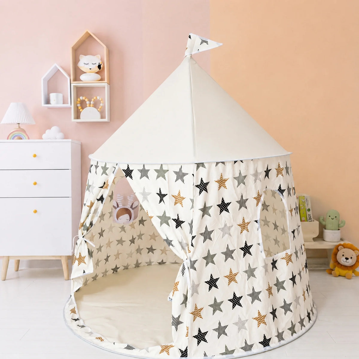 Tienda de juegos infantil con estampado de estrellas blancas y abertura frontal, ideal para crear un espacio acogedor y divertido para niños. 1