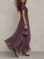 Vestido maxi morado con escote vintage y mangas de encaje, ideal para ocasiones formales y eventos elegantes. 1