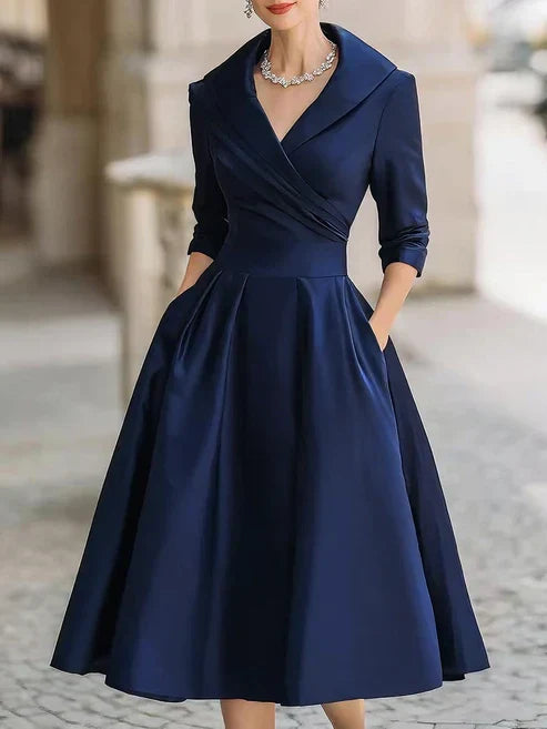 Vestido midi elegante con escote en V y mangas 3/4, ideal para ocasiones especiales y eventos formales, en un diseño moderno y 2