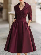 Vestido midi elegante con escote en V y mangas 3/4, ideal para ocasiones especiales y eventos formales, en un diseño moderno y 3