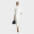 Vestido de mujer de punto negro con cuello alto y mangas largas, diseño holgado elegante ideal para otoño e invierno. 2