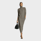 Vestido de mujer de punto negro con cuello alto y mangas largas, diseño holgado elegante ideal para otoño e invierno. 3