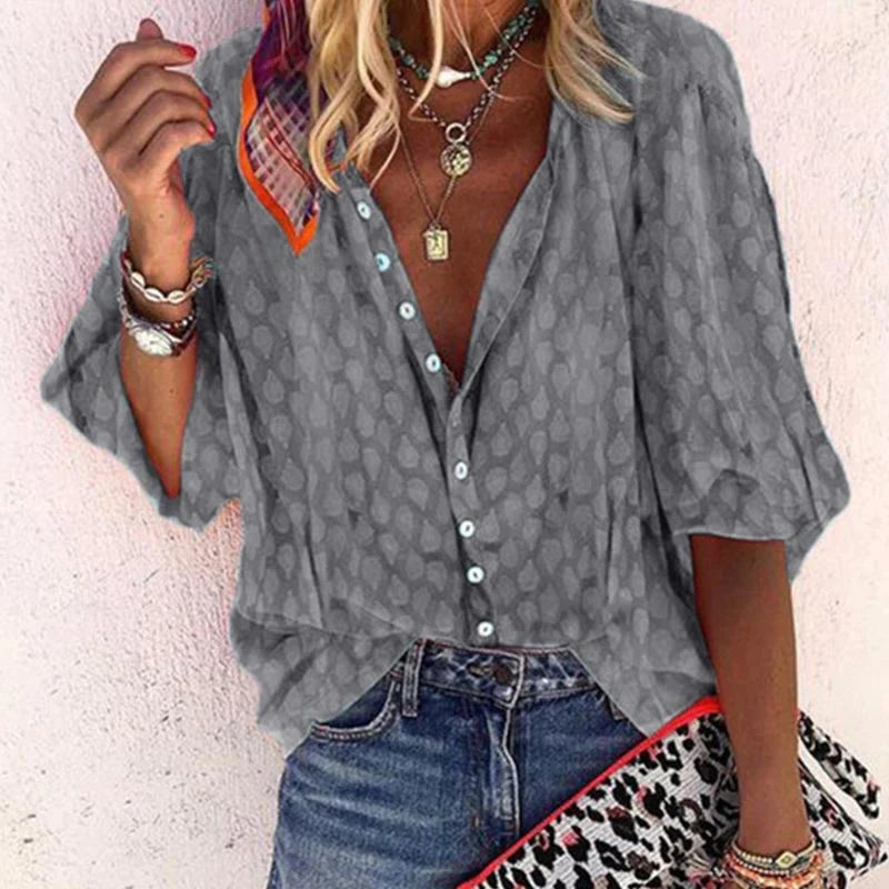 Blusa diseño color gris vista frontal